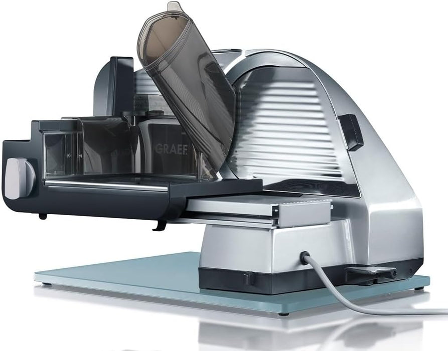 Graef Electrical Slicer Master 90 Silver. Electric Meat Slicer. Suitable for Meat, Cheese, Bread, Fruit and Vegetables. 0-20mm Slices with a 170mm Steel Blade, 30° tilt-Function, 170 watt Motor.