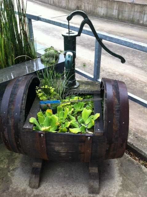 Oak Whiskey Barrel Lying Down with Cast Iron Pump