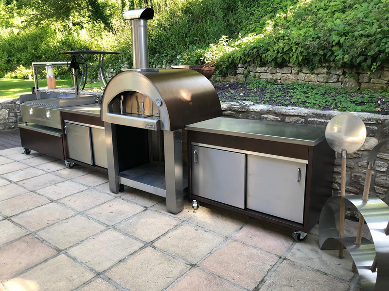 Outdoor kitchen Argentina style BBQ & Pizza oven